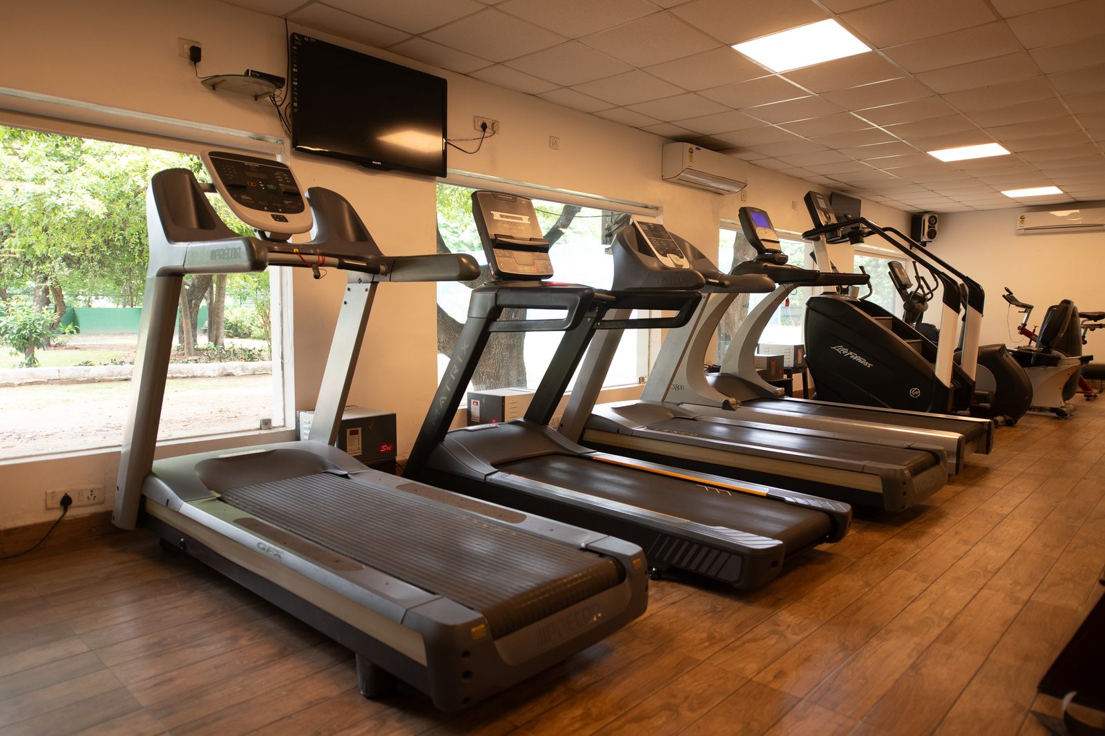 Treadmills and cardio equipment in the Madras Gymkhana Club gymnasium